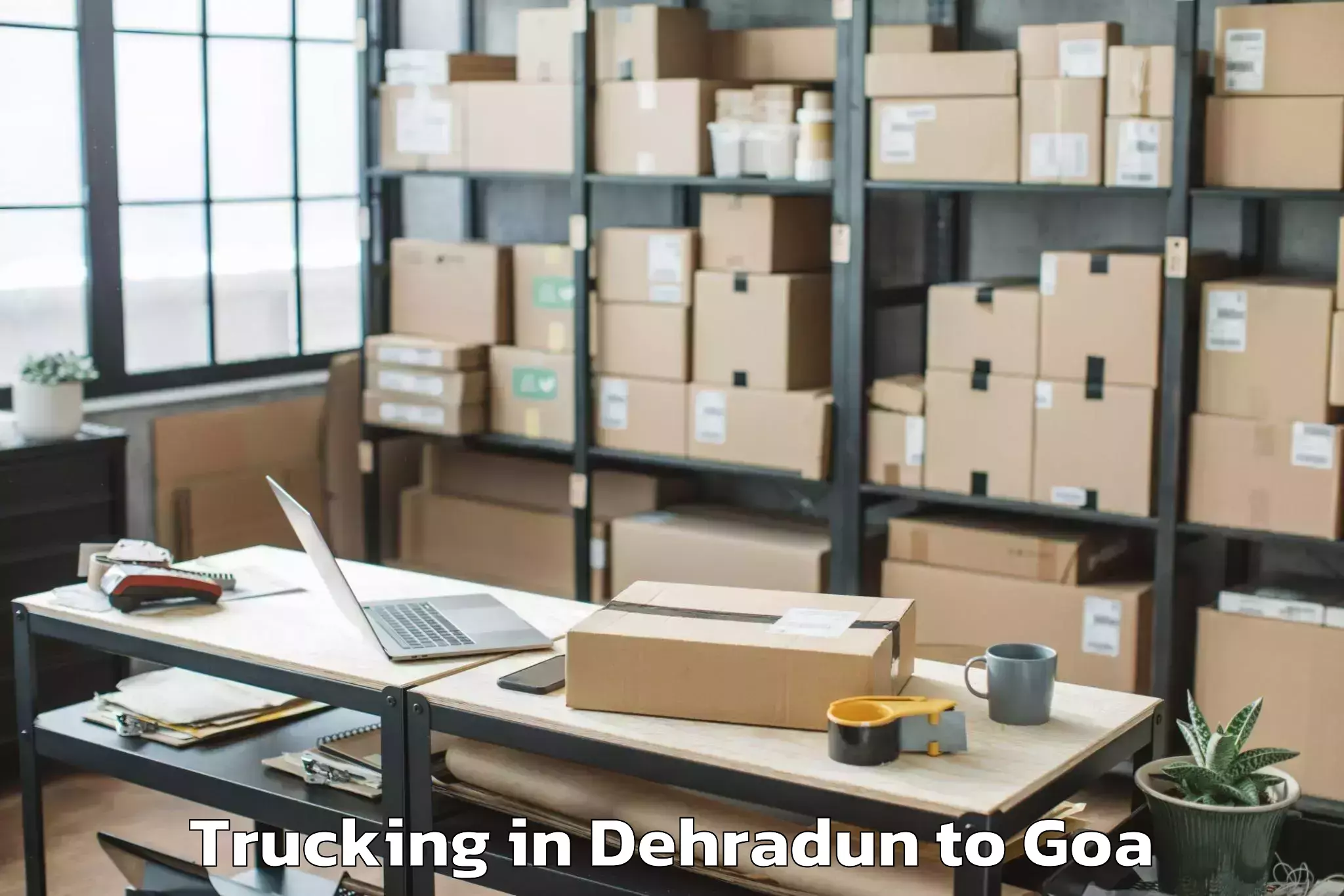 Book Dehradun to Guirim Trucking Online